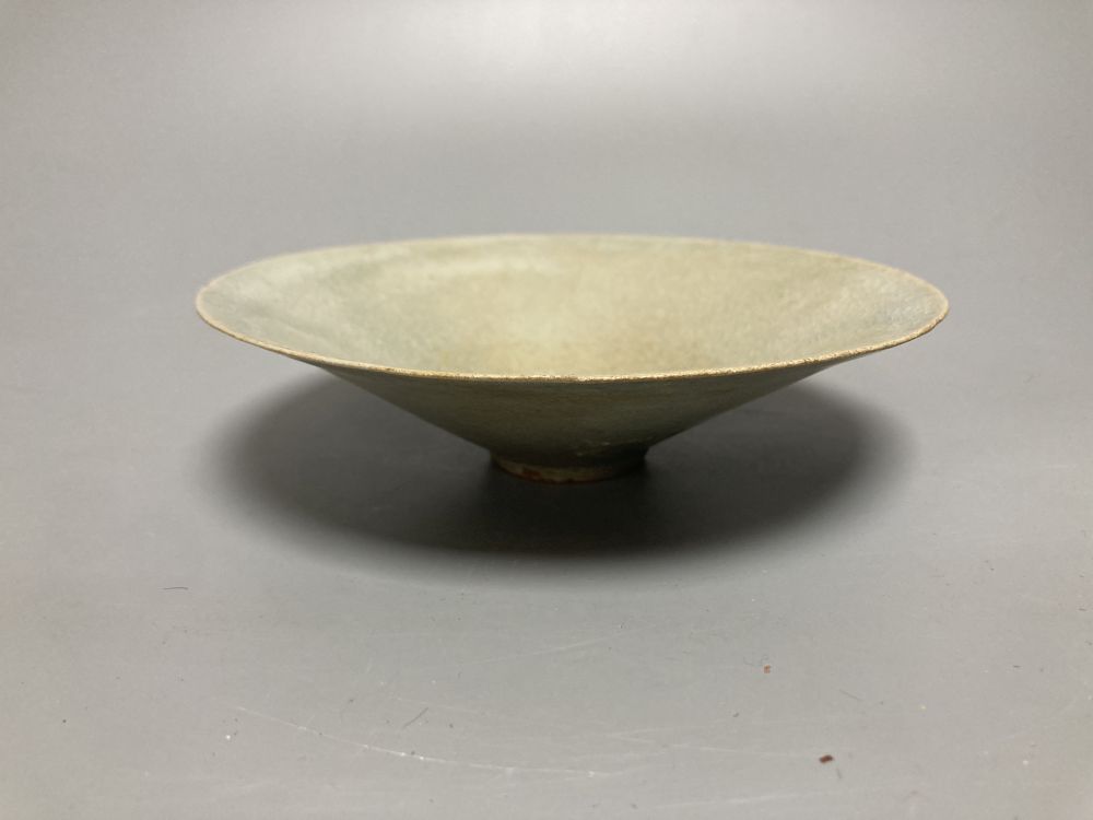 A Chinese Longquan celadon bowl, Song dynasty, 16cm, a conical celadon dish and a seal paste box base